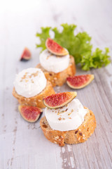 bread with cheese and fresh fig