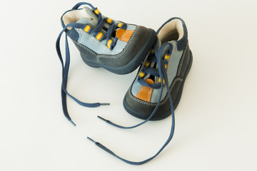 seasonal children's shoes isolated over the white