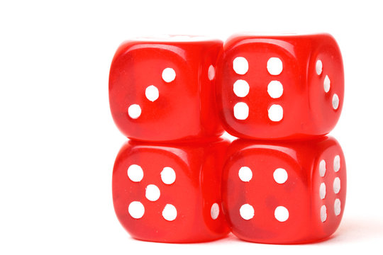 rolling red dice isolated on white