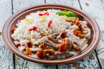 Beef stroganoff with mushrooms and rice