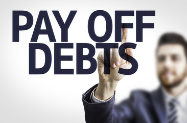 Business man with the text Pay Off Debts