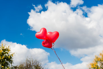 Valentine heart balloon against blue sky background