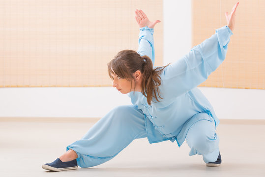 Woman Doing Qi Gong Tai Chi Exercise