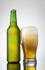 Beer in glass and bottle ready for branding