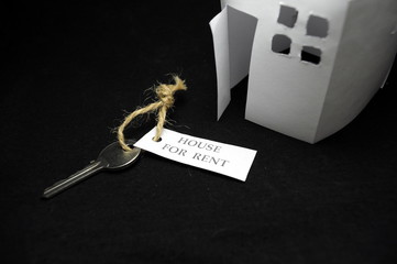 House for rent on black background