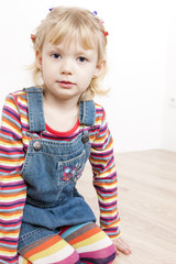 portrait of little girl wearing dress
