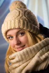 Portrait of the girl in a knitted cap