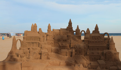 Sandy castle on beach