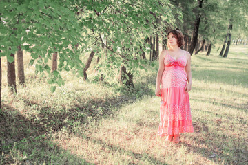 Beautiful pregnant woman outdoor