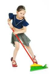 Cute little girl singing during cleaning