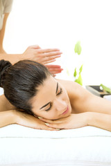Obraz na płótnie Canvas Young woman having a massage