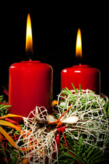 Lightning the candles on advent wreath