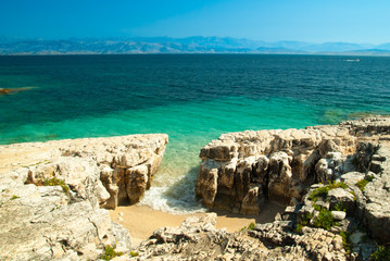 Fototapeta na wymiar Rocky Kassiopi Beach, Corfu Island, Greece.