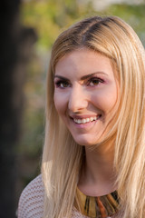 Naklejka premium Blonde attractive woman smiling