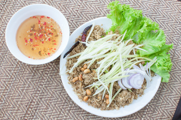 crispy catfish salad with green mango and vegetable