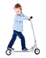 Boy playing with scooter © SzF Ilka Erika