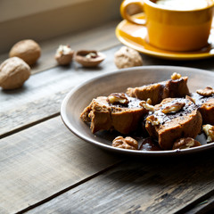 Cake with chocolate and tea with lemon