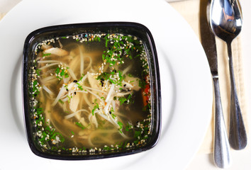 Chicken noodle soup with herbs
