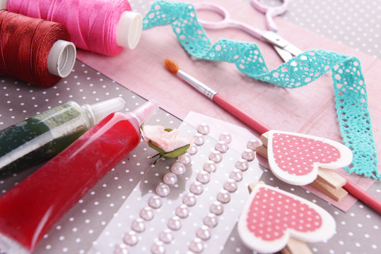 Scrapbooking craft materials on bright background