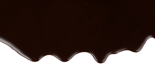 Melted chocolate dripping on white background