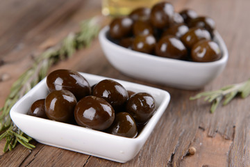 Marinated olives on table close-up