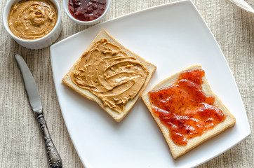 Sandwiches with peanut butter and strawberry jelly