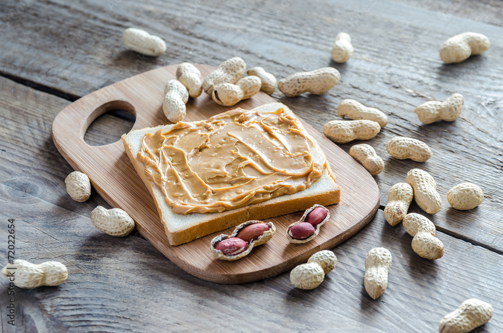 Sticker Sandwich with peanut butter on the wooden board