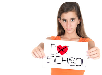 Girl holding a sign with the words I hate school