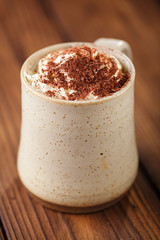 hot chocolat vintage mug, topping with cream and grated chocolat