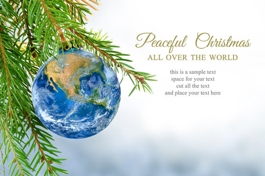 earth globe as christmas bauble, metaphor for universal peace, e