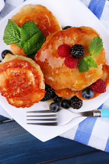 Tasty pancake with fresh berries and mint leaf