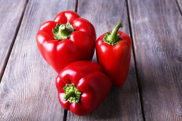 Red pepper on wooden background