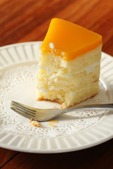 orange cake on white plate