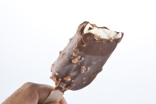 ice cream covered with chocolate and almonds.