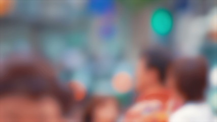 Crowd of anonymous people move through Tokyo