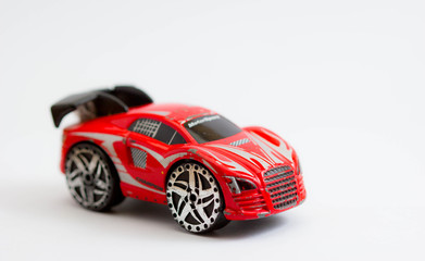 Metal toy car on white background
