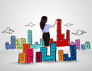 Business woman drawing city and building