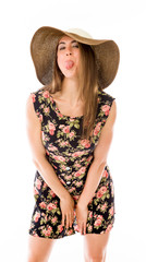 model isolated on plain background face sticking tongue out