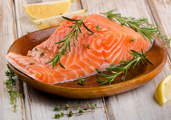 Fresh raw salmon fillet on a cutting board