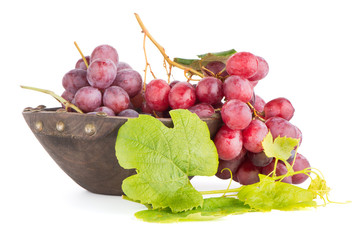 Fresh red grapes in wood bown