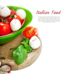 Mozzarella cheese with cherry tomatoes and basil