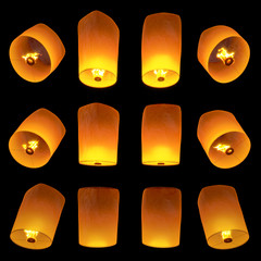 beautiful Lanterns flying isolated on black background