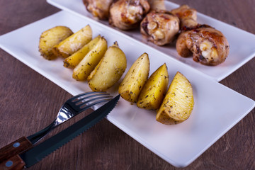roasted potatoes with chicken closeup