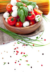 Mozzarella cheese with cherry tomatoes and basil