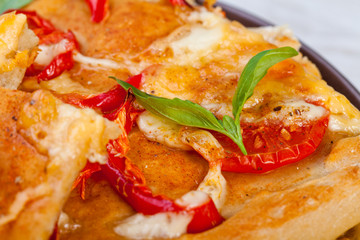 Delicious fresh pizza served on wooden table