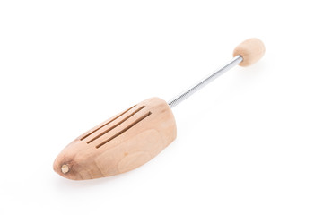 Wooden shoe tree isolated on white background