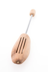 Wooden shoe tree isolated on white background