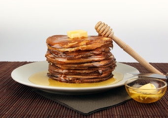 stack of pancakes with butter
