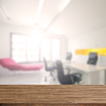 Wood desk decoration with Office Working Area background