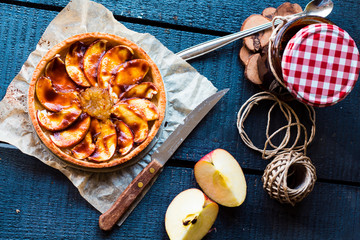 apple tart with pear jam and caramel, top view
